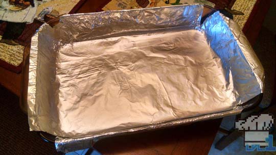 A tin foil lined pan for the Peanut Cheese Bar recipe for the Earthbound game series. 