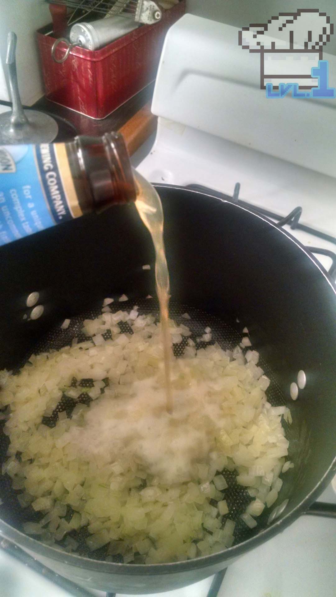 Beer pouring into simmering onions in large pot for Superb Soup recipe from Legend of Zelda Twilight Princess game series.