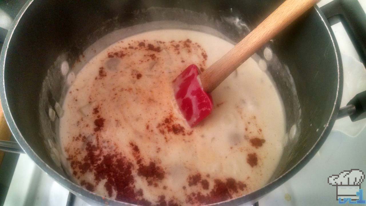 Heavy cream and remaining seasoning and ingredients have been added to the simmering pot of soup with the roasted potatoes.