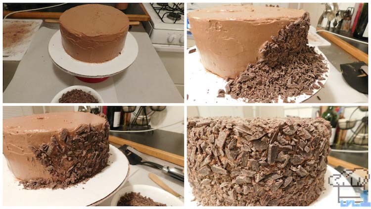 Adding chocolate shavings to the sides and top of the chocolate Portal cake until it is fully covered.