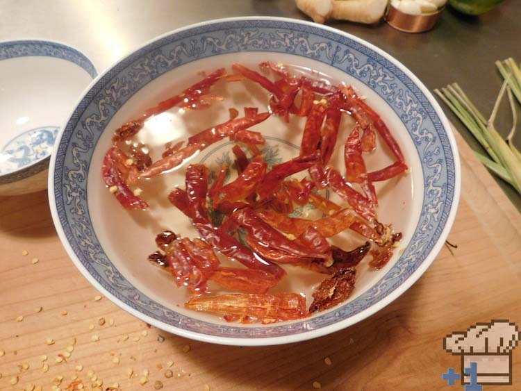 Dried ghost chilies rehydrating in a bowl of water to be turned into the curry paste base of Superspicy Curry from the Kirby's Dream Land game series.