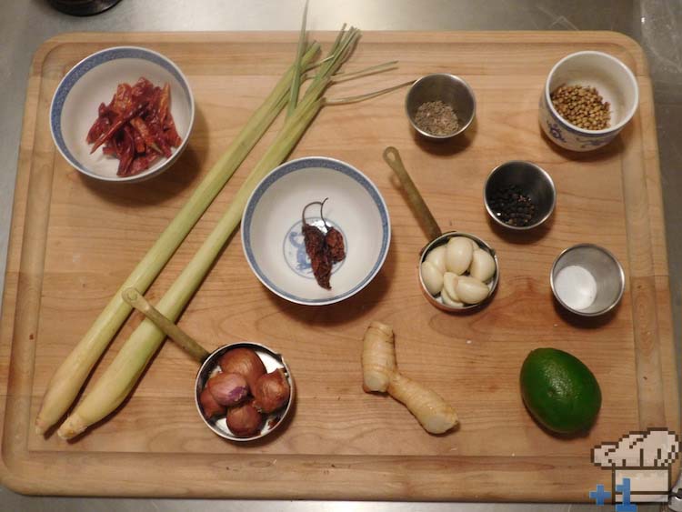 All of the Superspicy Curry recipe ingredients are lined up to be prepared.