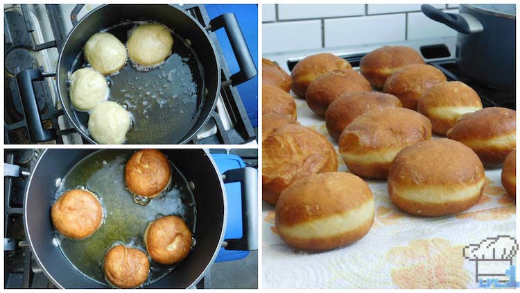 Frying the malasada doughnuts in hot oil before rolling them in sugar and filling them.