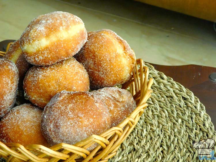 A basket full of sugared malasada doughnuts from the Pokemon game series.
