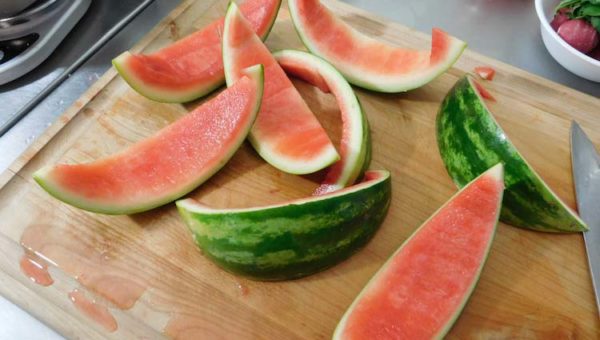 Slicing up watermelon for the Creamy Heart Soup recipe from the Legend of Zelda Breath of the Wild game series.