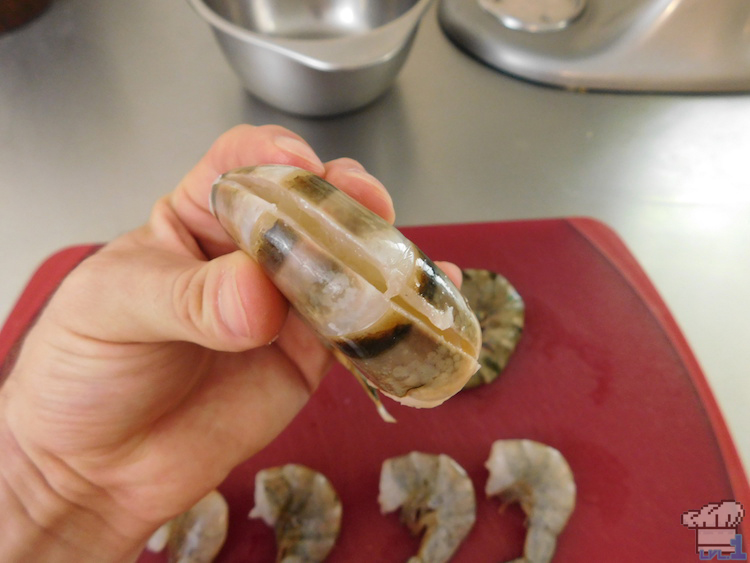 Cleaning the shrimp prior to breading and frying them for the Super Shwaffle food item from the Splatoon video game series.