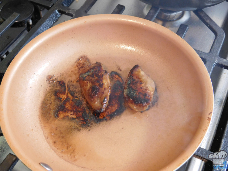 Pan searing the protein for the savory squab udon from the Hunt Cook: Catch and Serve mobile game